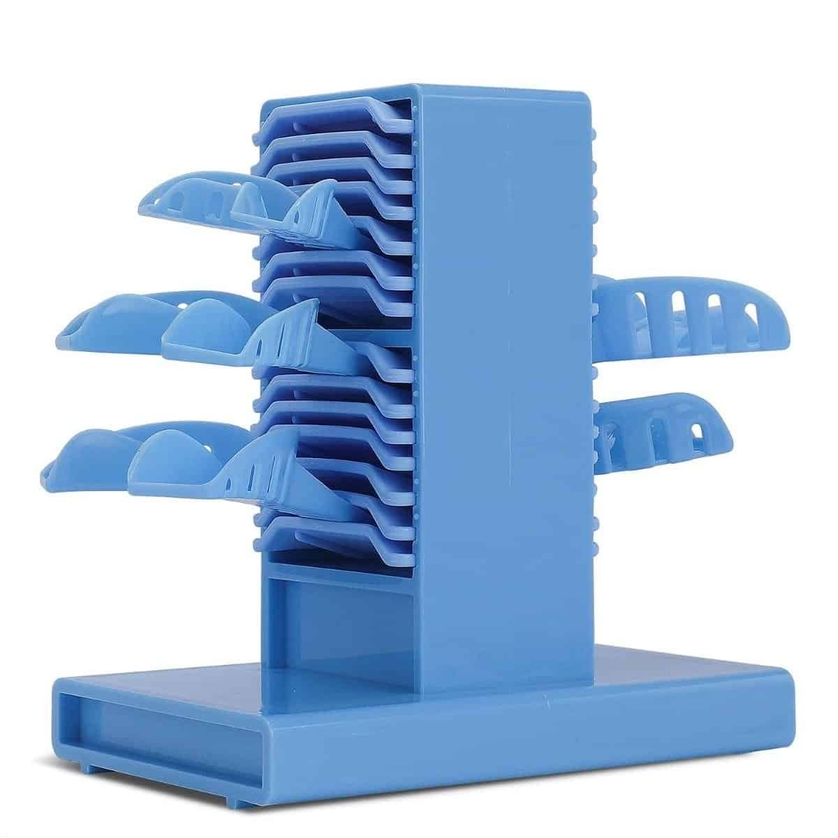 Blue dental impression bite blocks storage organiser for dental practice efficiency.