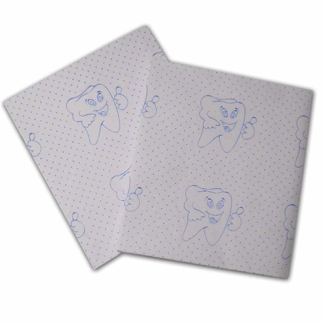 Super soft dental bib with cartoon tooth design for dental procedures.