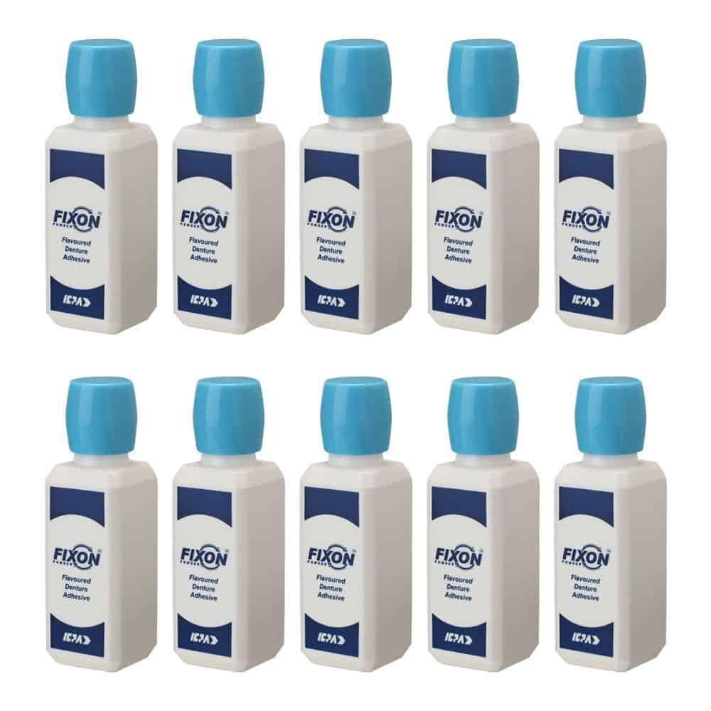 1. Bottle of dental denture adhesive cream with blue cap for prosthetic support.